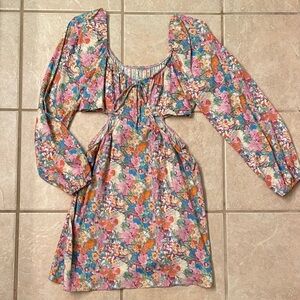 Multi-colored side cut out mini dress.